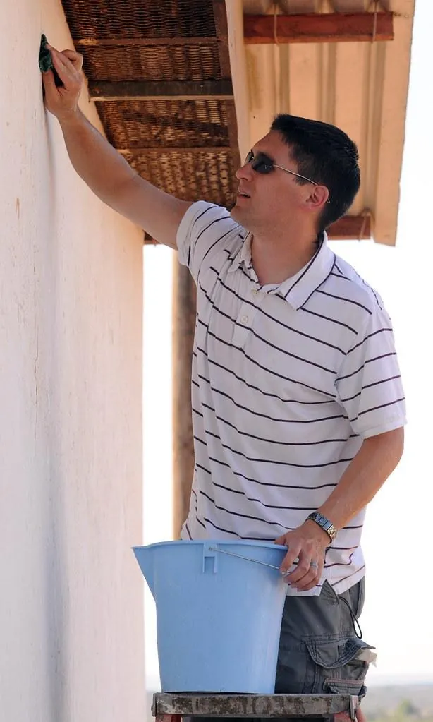 Washing and prepping an exterior wall before painting